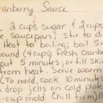 Great-grandma Larson's handwritten cranberry sauce recipe card.