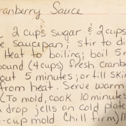 Great-grandma Larson's handwritten cranberry sauce recipe card.